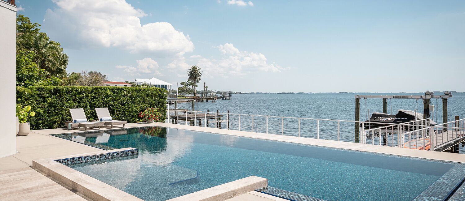 Beautiful luxury waterfront home featuring an Infiniti pool and views of the bay, Tampa Bay FL