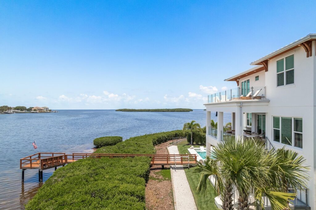 Elevated bayfront home with dock and open water views in Tampa Bay